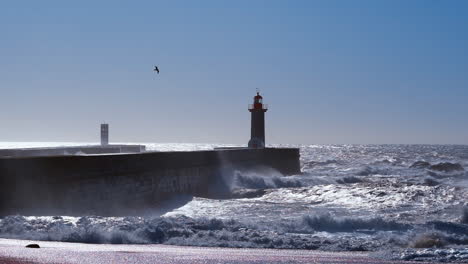 цinematic depiction of sizable waves crashing in proximity to the felgueiras lighthouse, located in porto, portugal, serves as a symbol of maritime legacy and coastal allure