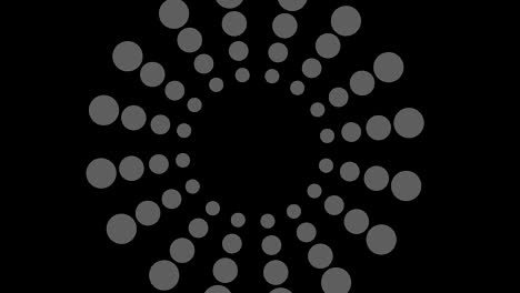 dibujo gráfico en blanco y negro con efecto estroboscópico e hipnótico, mientras gira en el sentido de las agujas del reloj y aumenta de tamaño.