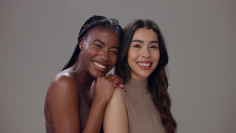two smiling women showing their friendship