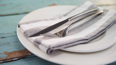 various cutlery on wooden table 4k