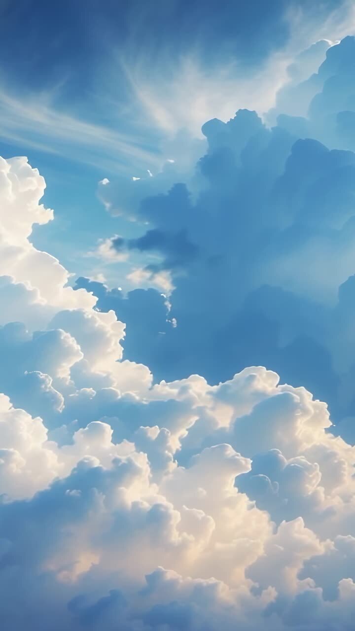 Vertical video: Starting aerial footage showing cumulus clouds drifting under sunlight, serene sky