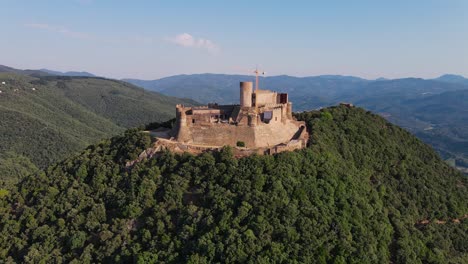 montsoriu castle perched on top of montseny natural park mountain in catalonia, spain