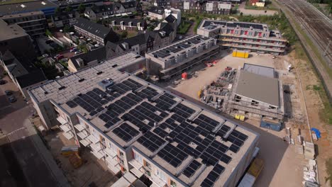 aerial approach and reveal of construction site ubuntuplein in urban development real estate investment project in new noorderhaven neighbourhood