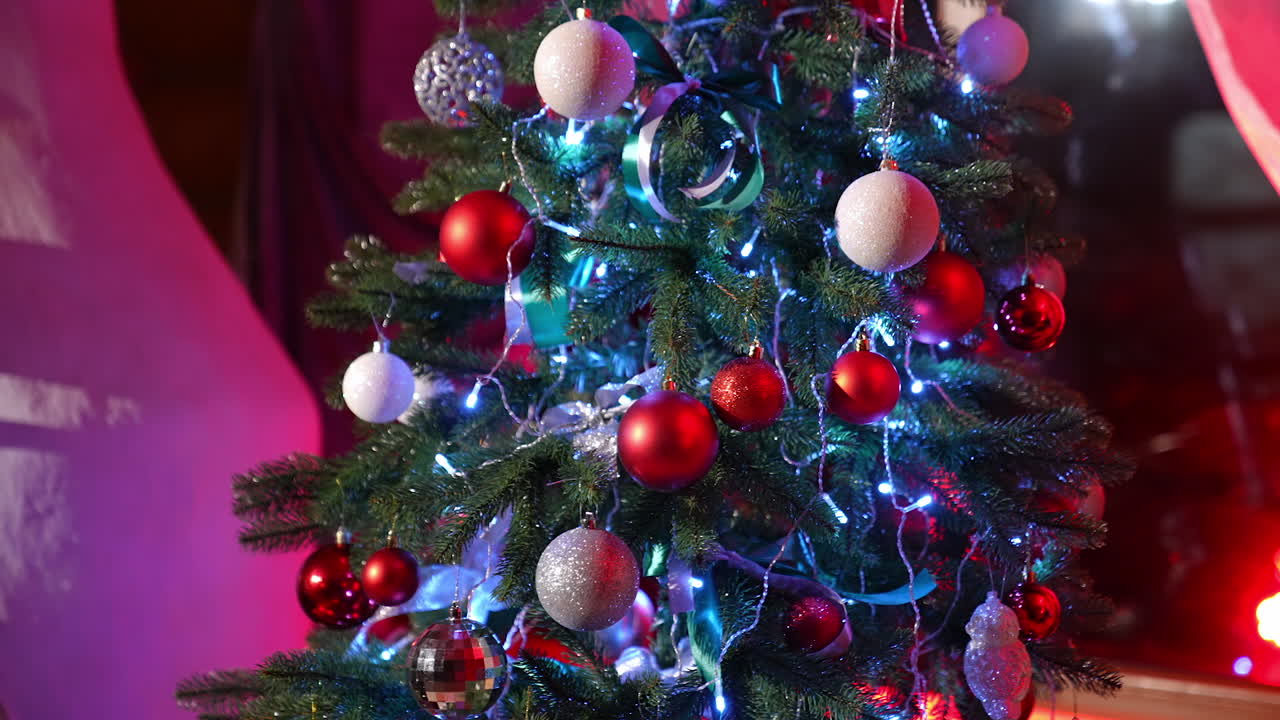 Christmas tree in living room. Christmas tree decorations in the room at night