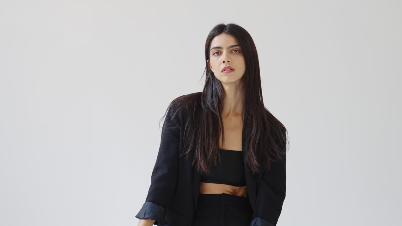 A woman in a black blazer