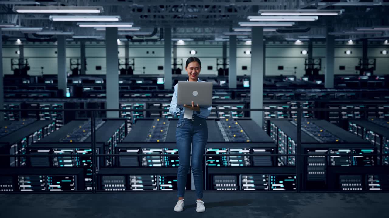 Woman working in a modern data center