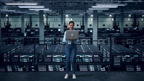 woman working in a modern data center