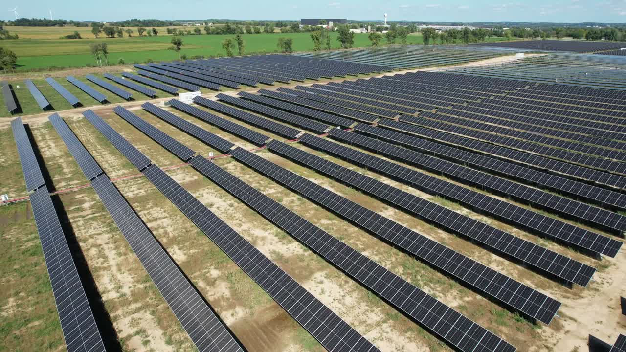 A Wisconsin field of solar panels absorbs the sun's energy and converts it to electricity