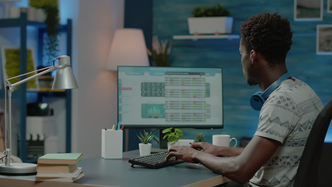 Man working with stock market trading value on computer