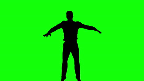 silhouette of man jumping with legs raised on green screen