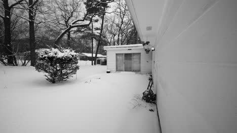 turning from snow covered yard to a home