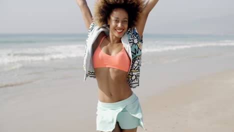 Woman-Joyful-With-Arms-Up