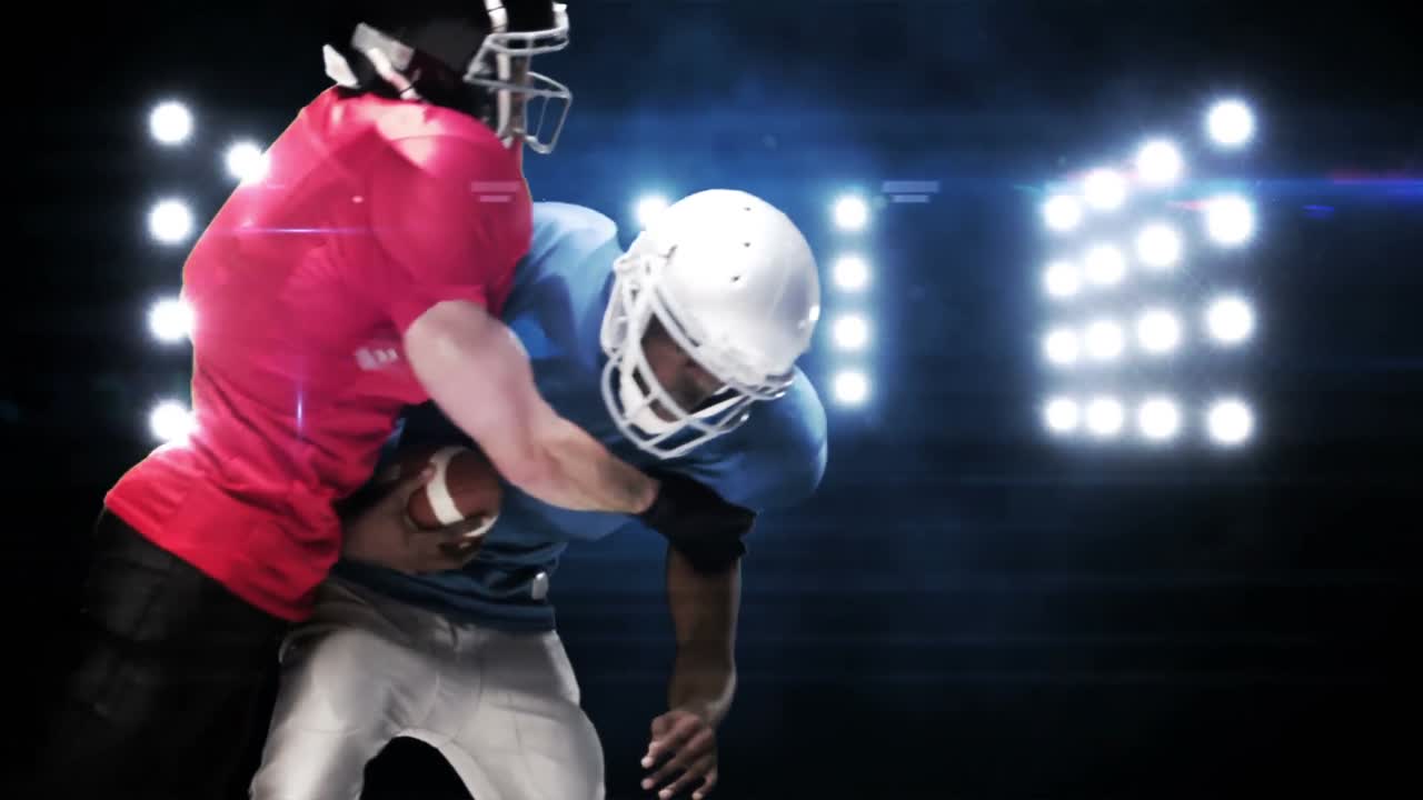 Giocatori di football americano contro luci lampeggianti