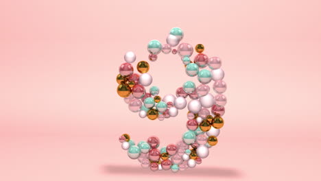 Number-9-made-of-beads,-glass-balls,-pastel-pearls,-crystal-jewels-and-gold