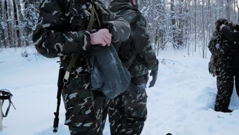 soldiers in winter training with gas masks