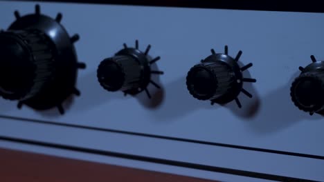 Slider-Shot-of-Bass-Amplifier-Knobs