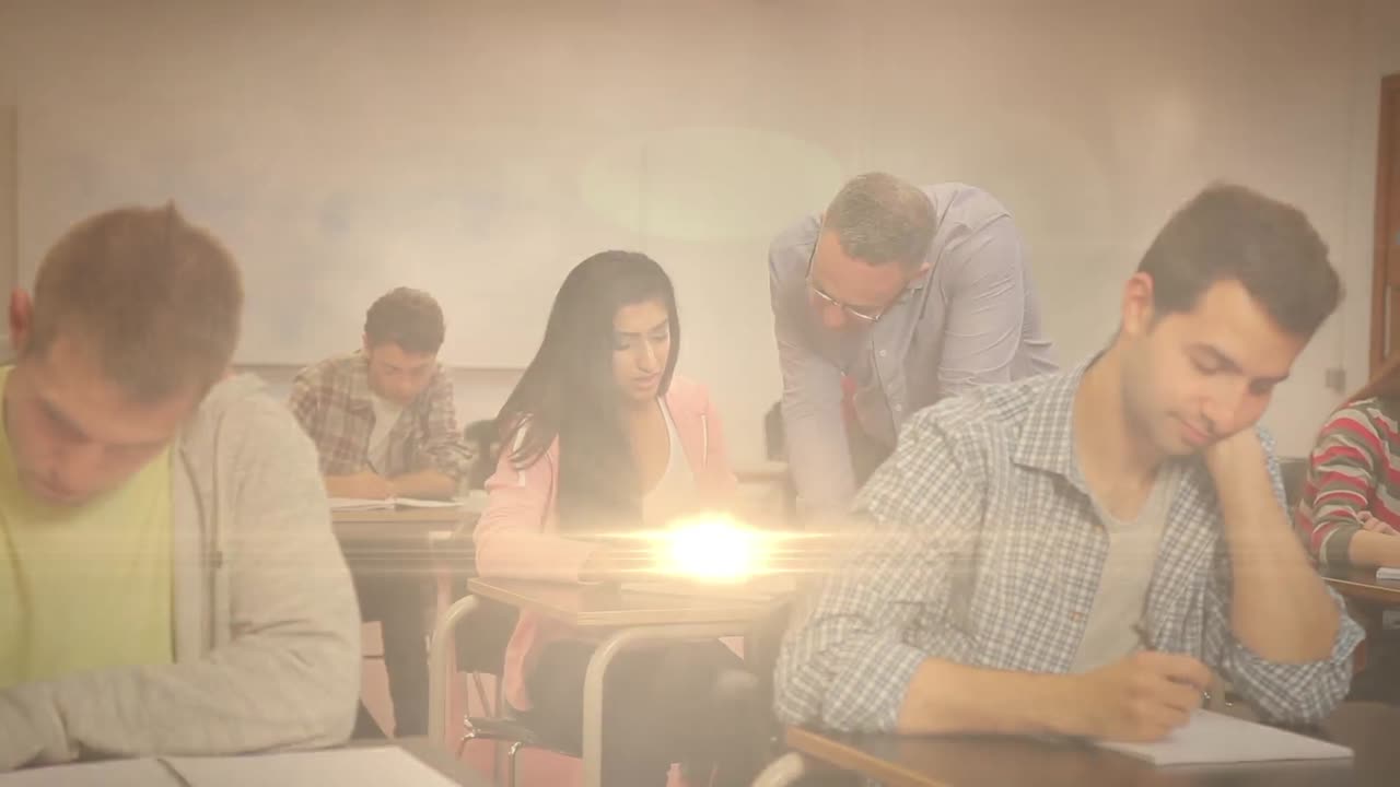 노트북에 글을 쓰는 다양한 학생들에 대한 빛의 애니메이션