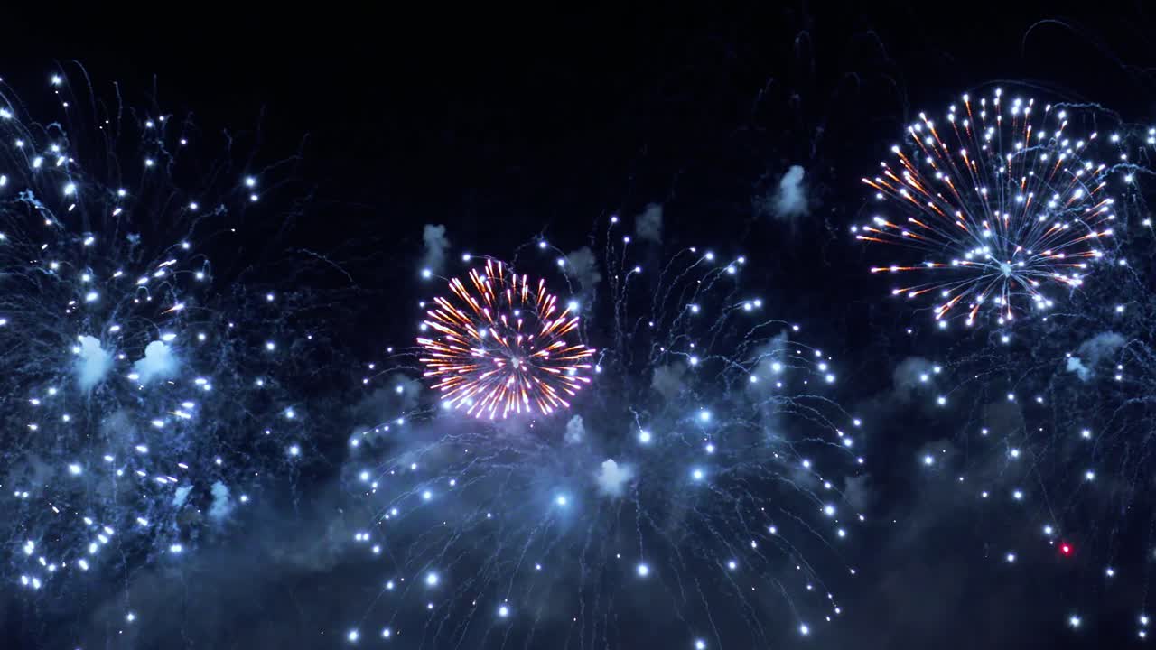 Colorful fireworks exploding in the night sky. Celebrations and events in bright colors.