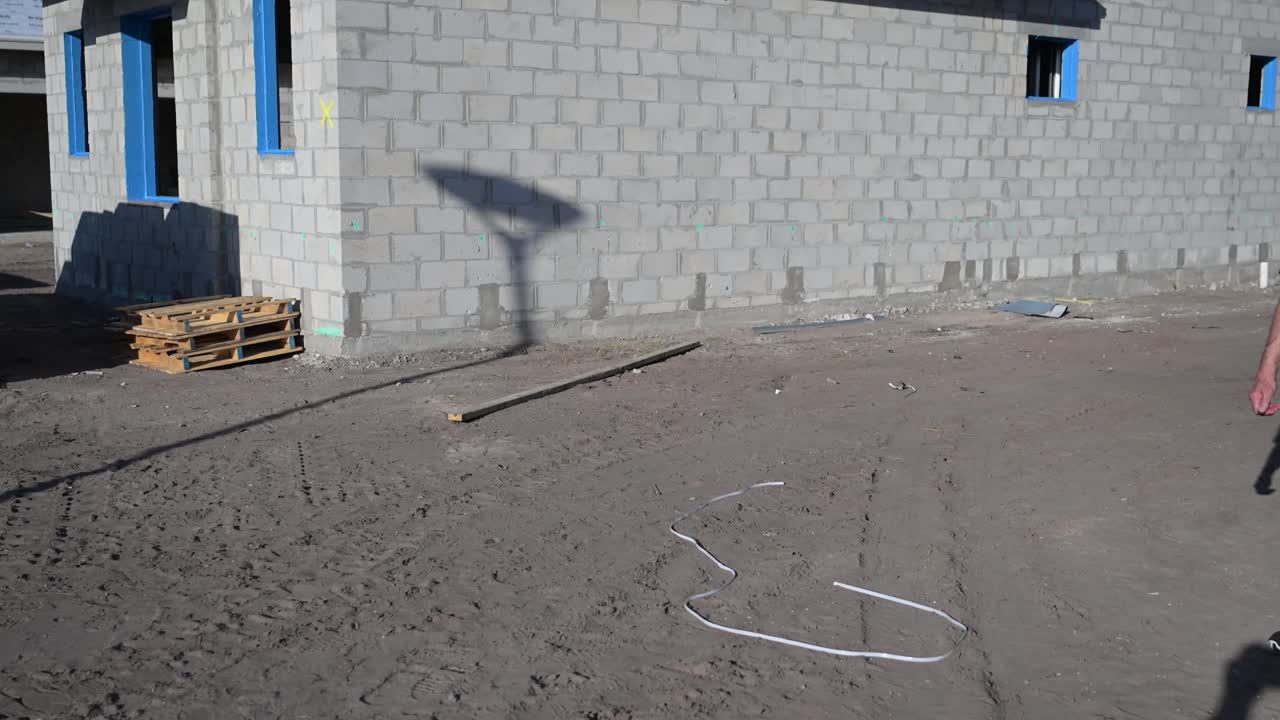 happy new construction home owner after a walk-through inspection before partial loan payment