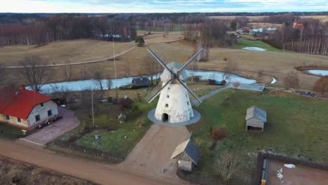 old araisi windmill in latvia aerial shot from above