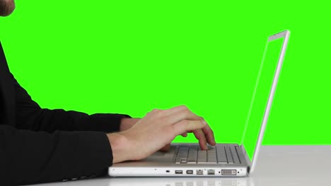 Businessman-hands-typing-on-laptop-keyboard