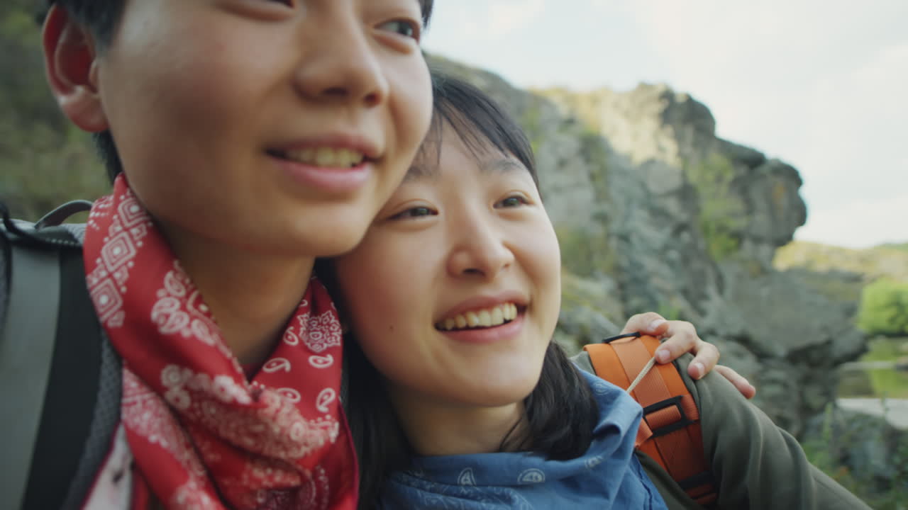 Asian Female Couple Enjoying Nature on Hike