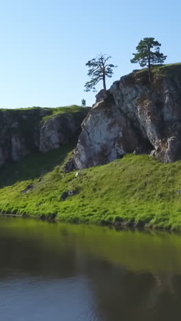 rocky river landscape with lush vegetation