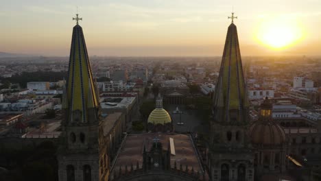 slow establishing shot of guadalajara cathedral during dramatic sunrise