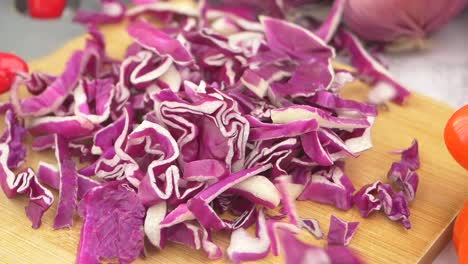 Chopped Red Cabbage on a Wooden Cutting Board