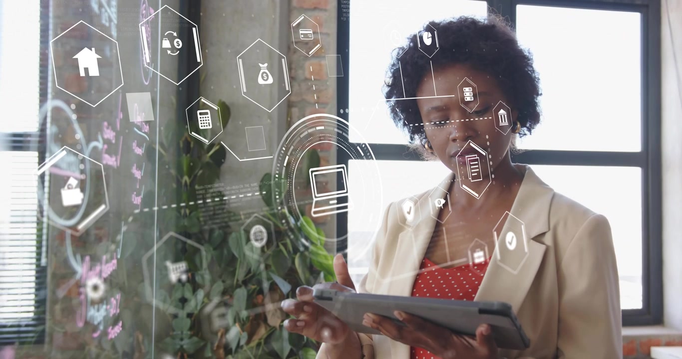Analyst raising forefinger and tapping tablet generating finance icons on glass panel for analysis