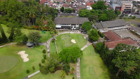 Aerial-view-of-people-were-gathering-and-playing-golf-on-the-golf-course