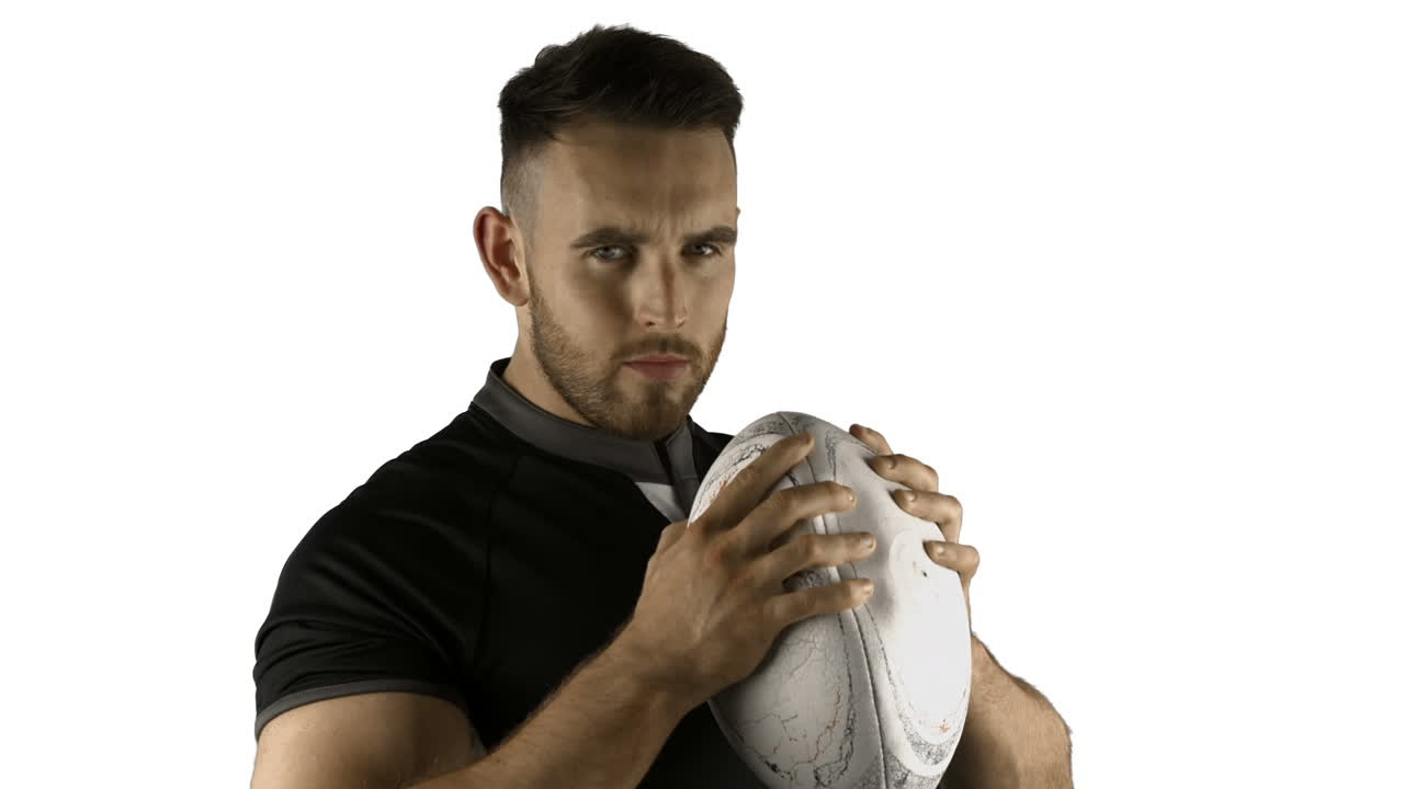 Giocatore di rugby serio con la palla
