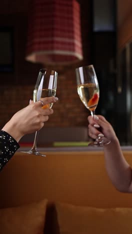 cheers! two women celebrating with champagne