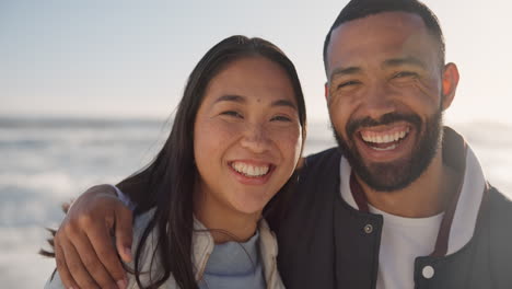 happy, beach and face of couple by ocean