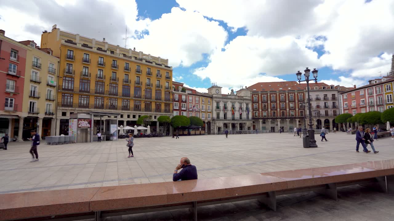 City center of Burgos. View of Plaza Mayor, historic city center of Burgos. Famous travel destination in Spain. Visited annually by many foreign tourists. Panoramic view. Camera panning right.