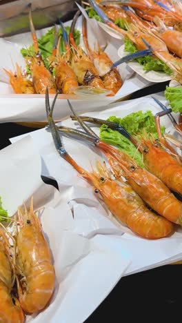 grilled shrimp display at a market