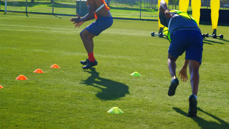 soccer players exercising in the field 4k