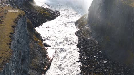 revealing drone shot of majestic dettifoss waterfalls in iceland