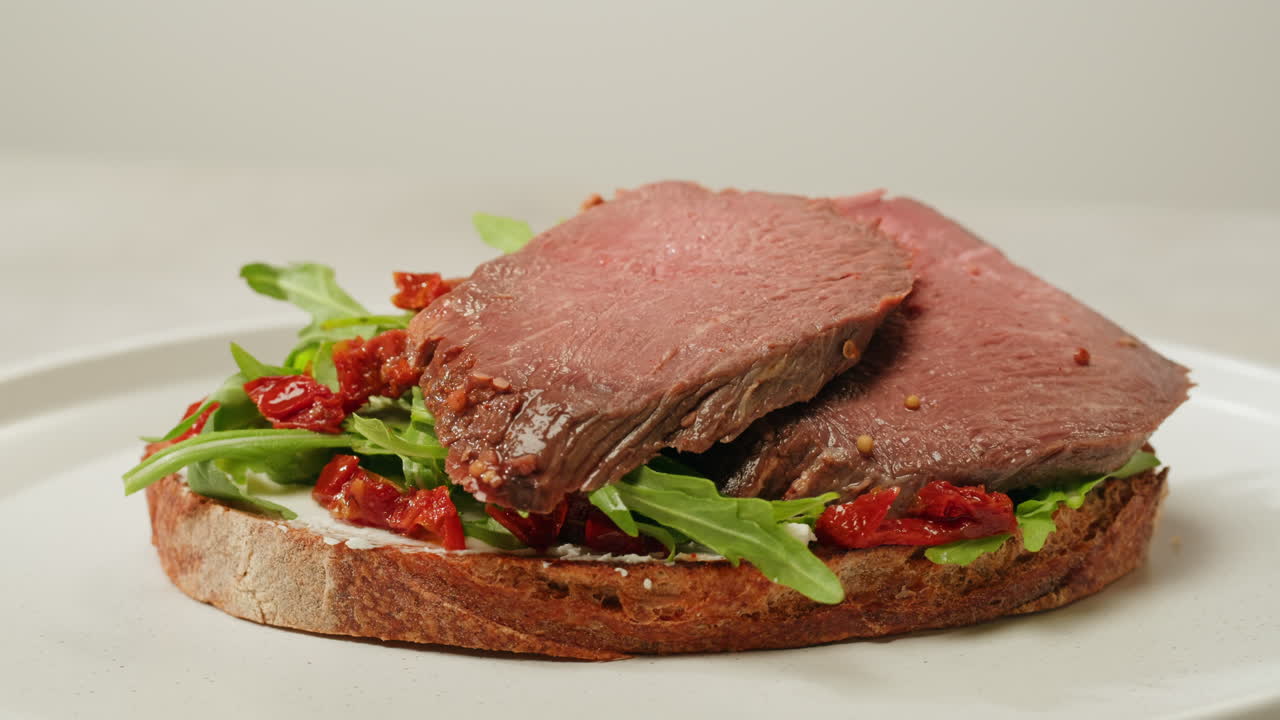 Roasted Beef Sandwich with Sun-dried Tomatoes and Arugula