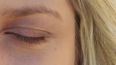 close up beautiful eye of woman blinking looking healthy eyesight concept