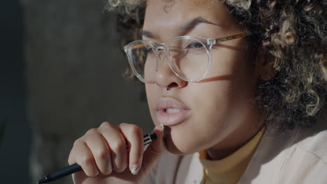 focused woman deep in thought