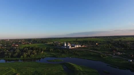 aerial view of a russian village and monastery