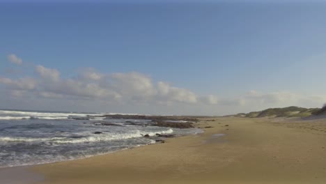 left to right pan along the shoreline of glen gariff beach in east london, south africa