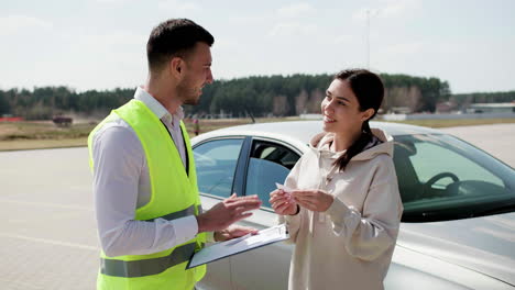 Woman-receiving-driving-license