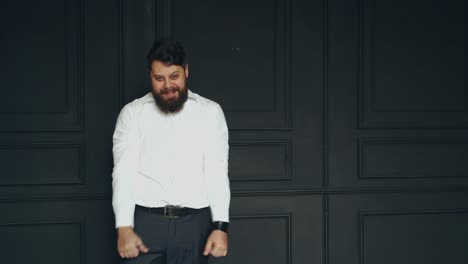 gentleman posing in studio. portrait of stylish handsome man with beard in studio