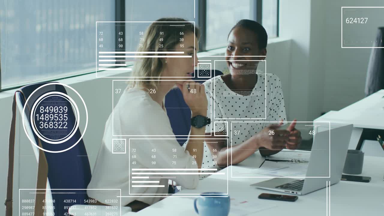 Business colleagues gesturing toward laptop producing animated charts and analyzing data insights