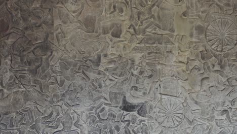 bas-relief stone carving in angkor wat, cambodia