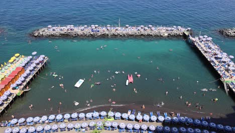 aerial view of tourists swimming in sorrento, italy