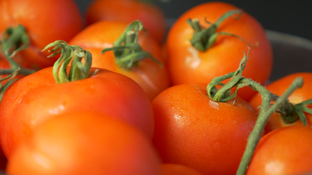 Juicy cherry tomatoes on kitchen table