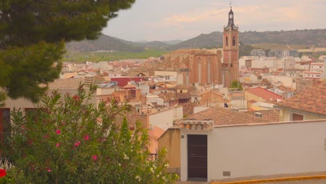 high angle shot over valencian community houses in historic city of sagunto, spain on a sunny day